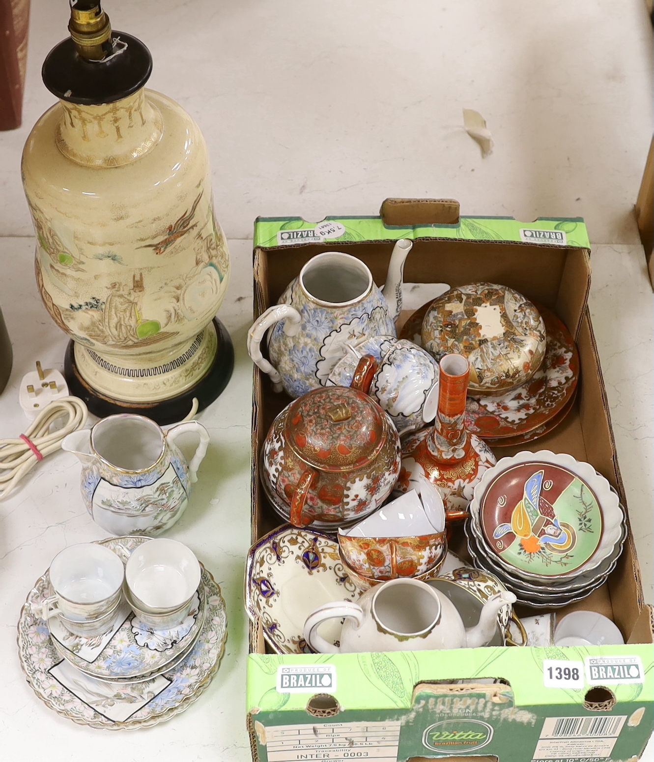 A group of Japanese ceramics, possibly Meiji including a teapot, a miniature Kutani vase and Japanese fluted bowls, etc., largest 21cm in diameter, a Japanese Satsuma lamp base and a pot and cover, possibly Meiji period,